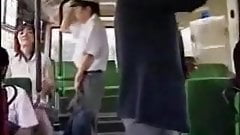 Japanese Milf and boy masturbate each other on the bus Pt1