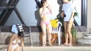 Asian schoolgirls have swimming glasses