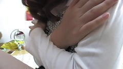 Naughty brunette sucks cock and gives expert footjob