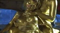 Queen tortures gold painted slave