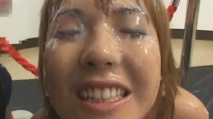 Asian babe in bukkake action