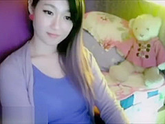 sexy Japanese webcam girl in blue – more at sexywebcum.com