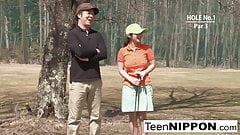 Cute Asian teen girls play a game of strip golf