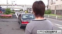 Hot Japanese babe fucks him in the car