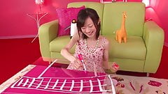 Japanese babe gets a toy in her tight pussy