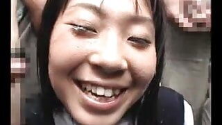 Japanese girl receives a bukkake  in public