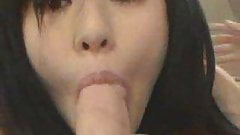 Long haired Asian beauty sucks a big boner in POV