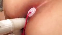 Vibe torture with enema