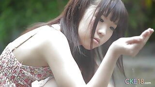 Shy Japanese teen Uri-chan playing by the water